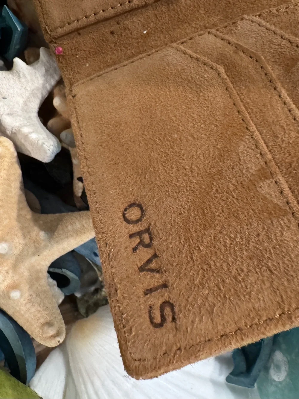 Orvis Brown Suede Card & Key Holder  has a small ink mark